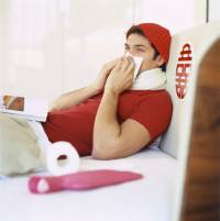 Young Man Wiping Nose